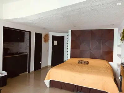 Cama o camas de una habitación en SUITE TORRES GEMELAS 2902 vista al mar