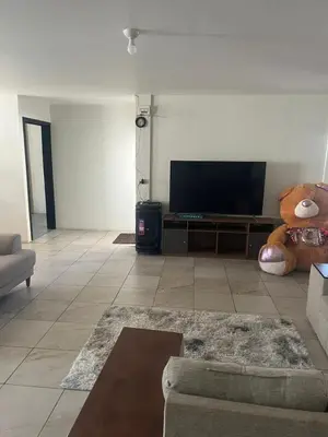 Una televisión o centro de entretenimiento en Casa habitación