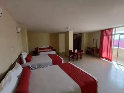 Cama o camas de una habitación en Hotel Royalty