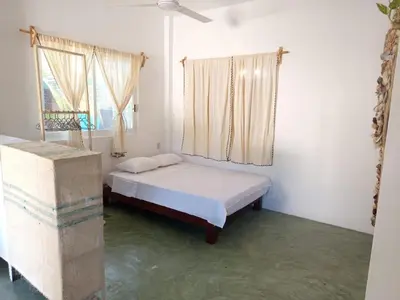 Cama o camas de una habitación en Zicatelas Depa