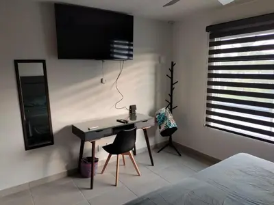 Cama o camas de una habitación en Fabuloso departamento de 4 recamaras en Dream Diamante