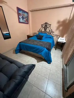 Cama o camas de una habitación en Hotel Los Reyes