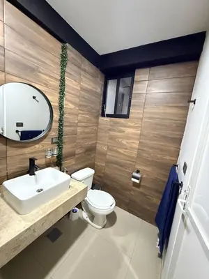 Un baño de Hermoso Departamento Moderno con alberca