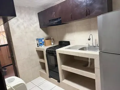 Una cocina o zona de cocina en Apartamento con vista hermosa y playa caleta