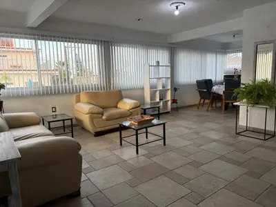 Zona de estar de Casa El nido de las flores