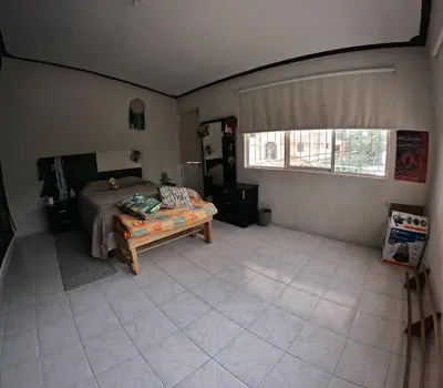 Cama o camas de una habitación en BretMon Departamento cerca del bosque de niebla