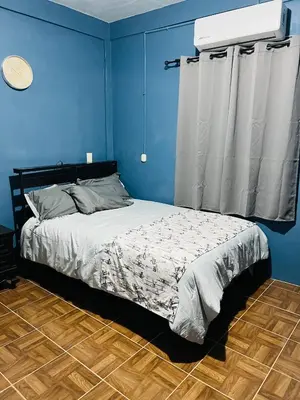 Cama o camas de una habitación en Departamento Flores