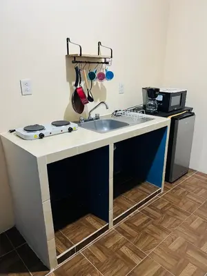Una cocina o zona de cocina en Departamento Flores