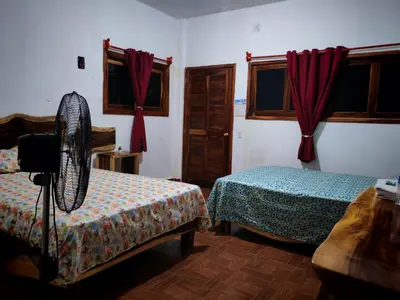 Cama o camas de una habitación en Huatunalco Beach Hotel