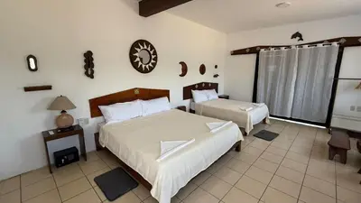 Cama o camas de una habitación en Punta Teresita Mezcal, inmejorable ubicacion