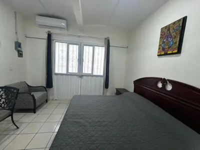 Cama o camas de una habitación en Loft Rafaella Céntrico y acogedor