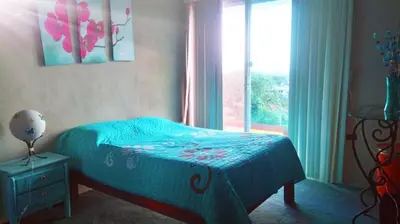 Cama o camas de una habitación en Hermosa Casa Colibri