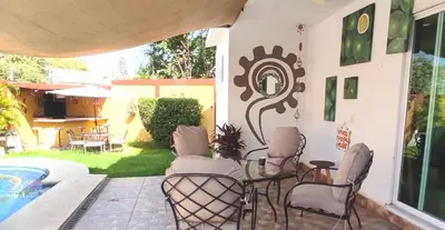 Jardín al aire libre en Hermosa Casa Colibri
