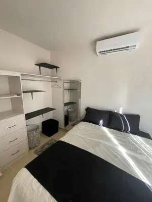 Cama o camas de una habitación en Alojamiento Elegante