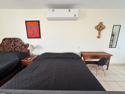 Cama o camas de una habitación en Loft Renée a 10 minutos del Zócalo