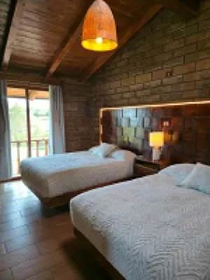 Cama o camas de una habitación en cabañas el rio alcatraz