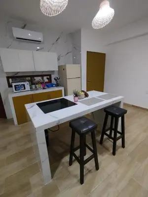 Una cocina o zona de cocina en Bello departamento con jacuzzi y vista al mar