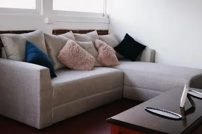 Zona de estar de Cozy apartment near the Bosque de Niebla