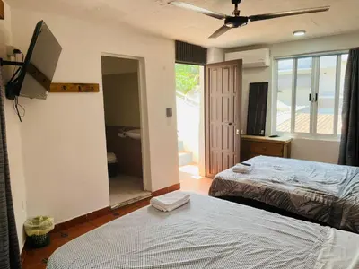 Cama o camas de una habitación en Casa Iguanas, ubicación inmejorable en la bahia principal