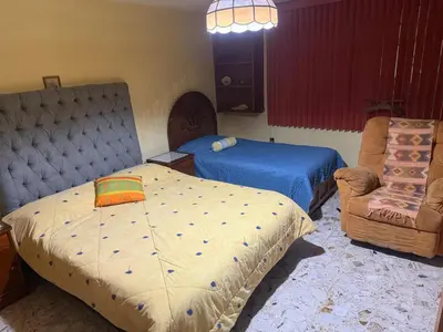 Cama o camas de una habitación en Alojamiento de descanso
