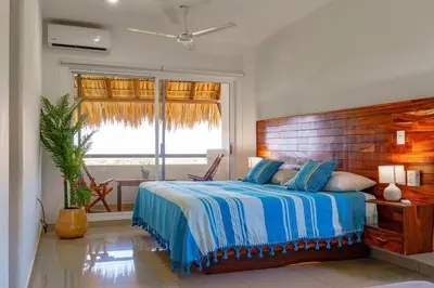 Cama o camas de una habitación en Condominio Saman Tu Oasis de Tranquilidad