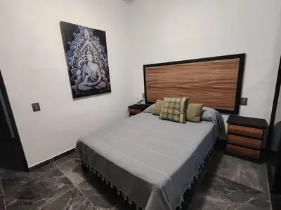 Cama o camas de una habitación en House near the best restaurants and garden events