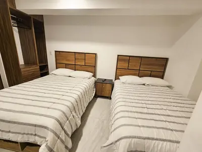 Cama o camas de una habitación en Centro Expositor, Zona historica los Fuertes