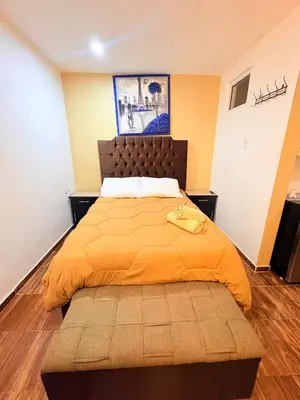 Cama o camas de una habitación en Hospedaje La Gardenia
