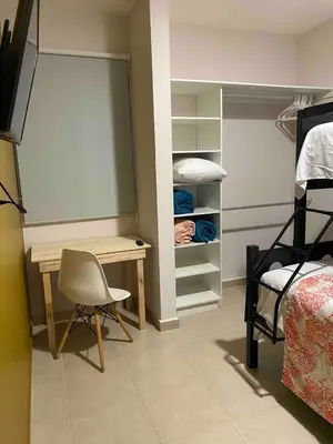 Cama o camas de una habitación en Departamento Coral