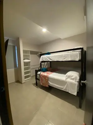 Cama o camas de una habitación en Departamento Coral