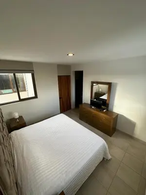 Cama o camas de una habitación en Depa Isla del Amor con alberca, y acceso al río y la playa