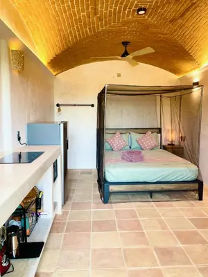 Cama o camas de una habitación en Casa Kino Estudio Sombra close to Rinconcito beach incl Starlink and airconditioning