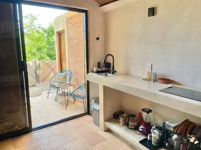 Una cocina o zona de cocina en Casa Kino Estudio Sombra close to Rinconcito beach incl Starlink and airconditioning