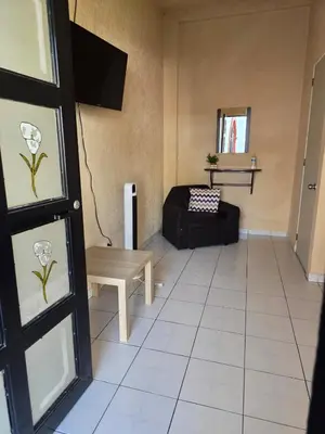Una televisión o centro de entretenimiento en Hotel Casa del virrey Atlixco