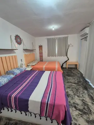 Cama o camas de una habitación en Rubí y Antonella