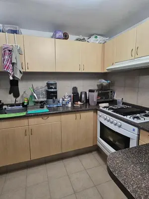 Una cocina o zona de cocina en Departamento Completo, Excelente Ubicación