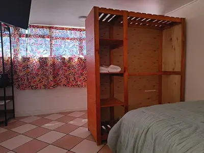 Cama o camas de una habitación en Rincon Hortensia apartments and loft