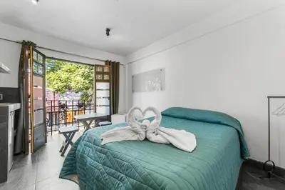 Cama o camas de una habitación en Suites Calle Berlin