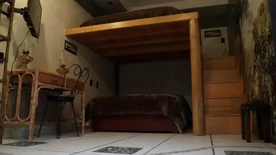 Cama o camas de una habitación en Suites Calle Berlin