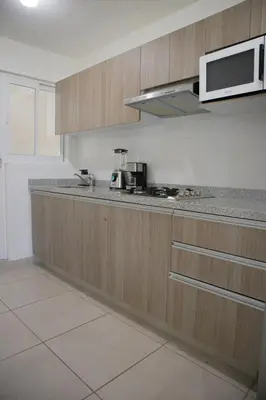 Una cocina o zona de cocina en Escapada familiar, departamento para 8 con Club de Playa incluido