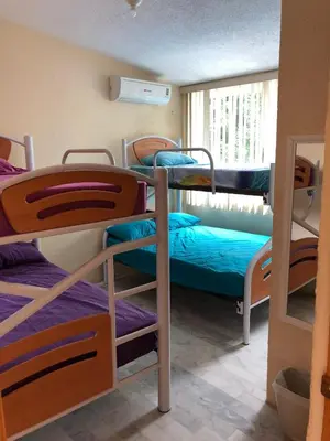 Cama o camas de una habitación en Acapulco casa almirante