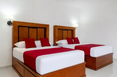 Cama o camas de una habitación en Hotel alcazar de luna