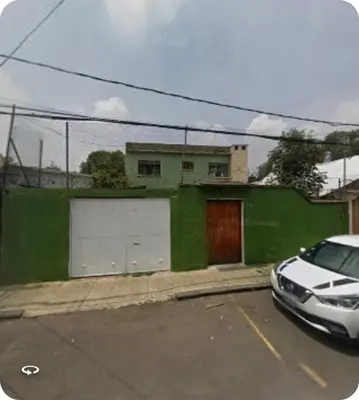 Edificio en el que se encuentra la habitación en casa particular