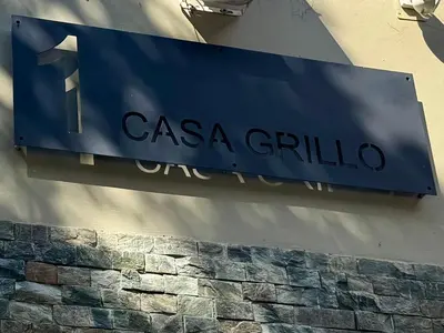 Certificado, premio, señal o documento que está expuesto en Casa Grillo Huatulco