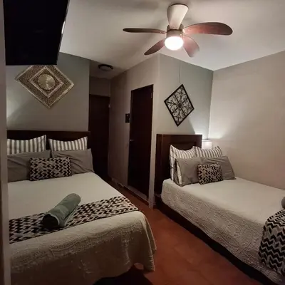 Cama o camas de una habitación en Hotel Hacienda Entabladero