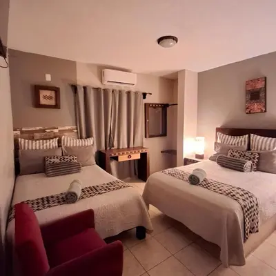 Cama o camas de una habitación en Hotel Hacienda Entabladero