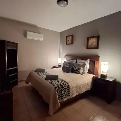 Cama o camas de una habitación en Hotel Hacienda Entabladero