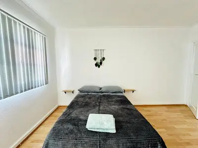 Cama o camas de una habitación en Casa grande con todos los servicios centrica