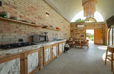 Una cocina o zona de cocina en Residencial Pacific Palmarito Oaxaca