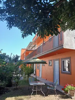 Edificio en el que se encuentra la habitación en casa particular